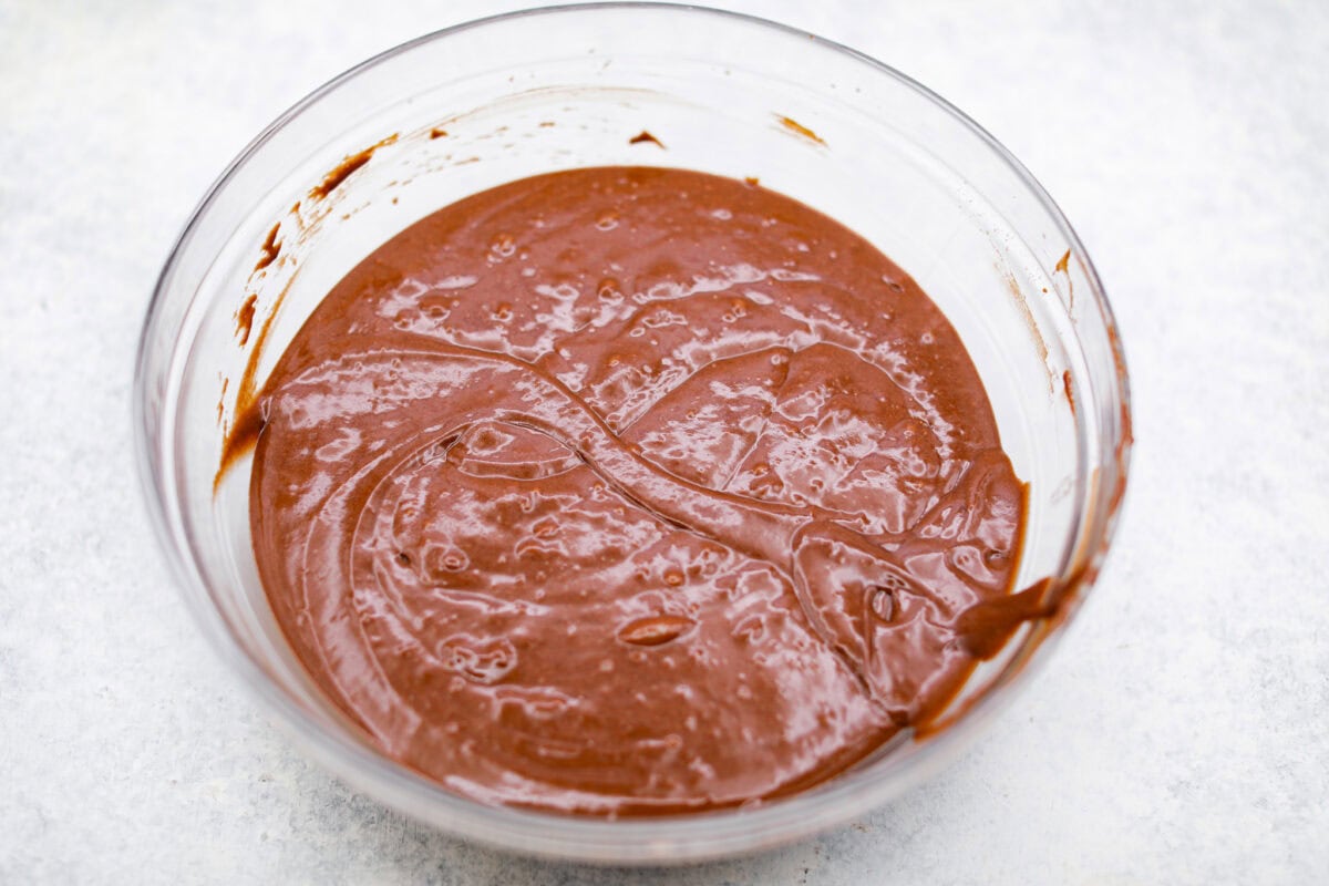 Chocolate Mayonnaise Cake is a rich, moist, and decadent dessert that’s super easy to make! The mayonnaise adds extra moisture and creates a soft, tender crumb. Whether for a special occasion or just because it's sure to impress! Overhead shot of the mayo mixture combined with the flour mixture.
