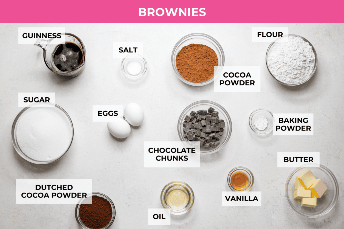 Rich, fudgy, and packed with deep chocolate flavor, Guinness Brownies are a must-try for any dessert lover! The stout beer enhances the cocoa, adding a subtle, malty depth of flavor that makes these brownies rich and irresistibly delicious. Overhead shot of labeled brownie ingredinets.